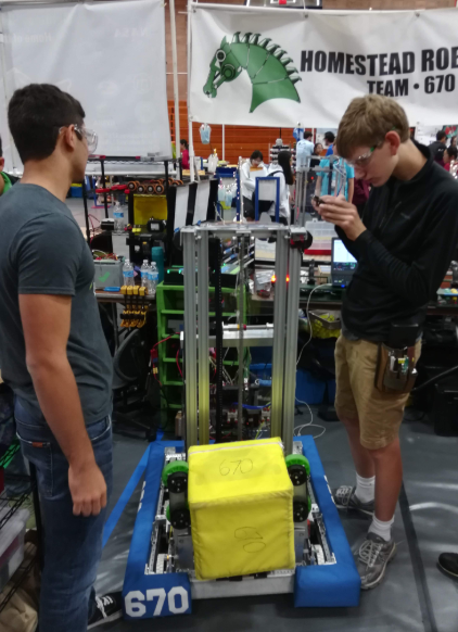 Ben and Nick working in the pit before a match